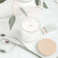 hand poured soy candles in a clear jar with bamboo lid