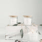 hand poured soy candles in a clear jar with bamboo lid