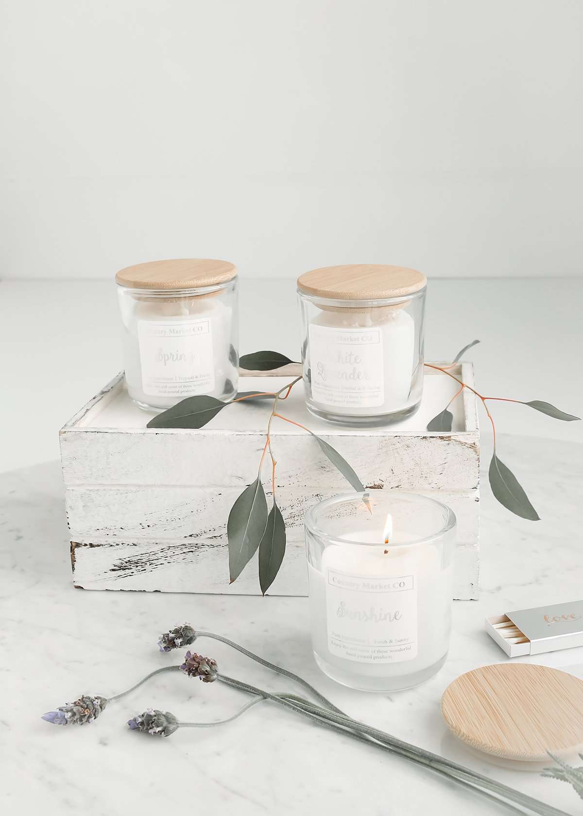 hand poured soy candles in a clear jar with bamboo lid