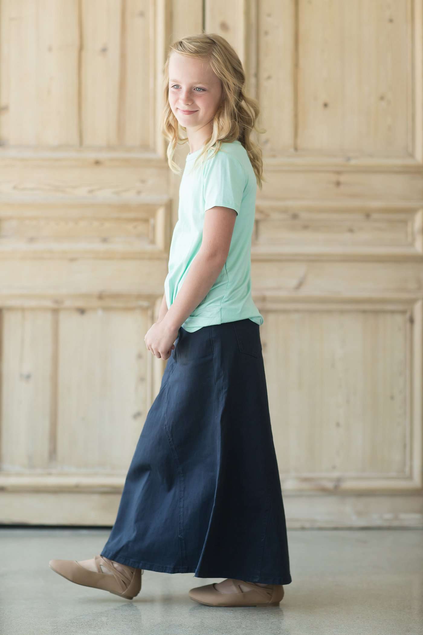 Modest girl's long navy skirt. A-line insert for a flowy, fun look.