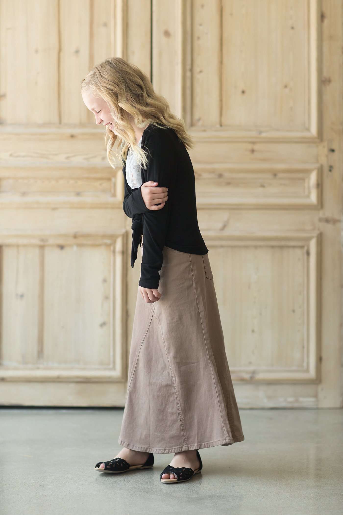 Modest girl's long khaki skirt. A-line insert for a flowy, fun look.