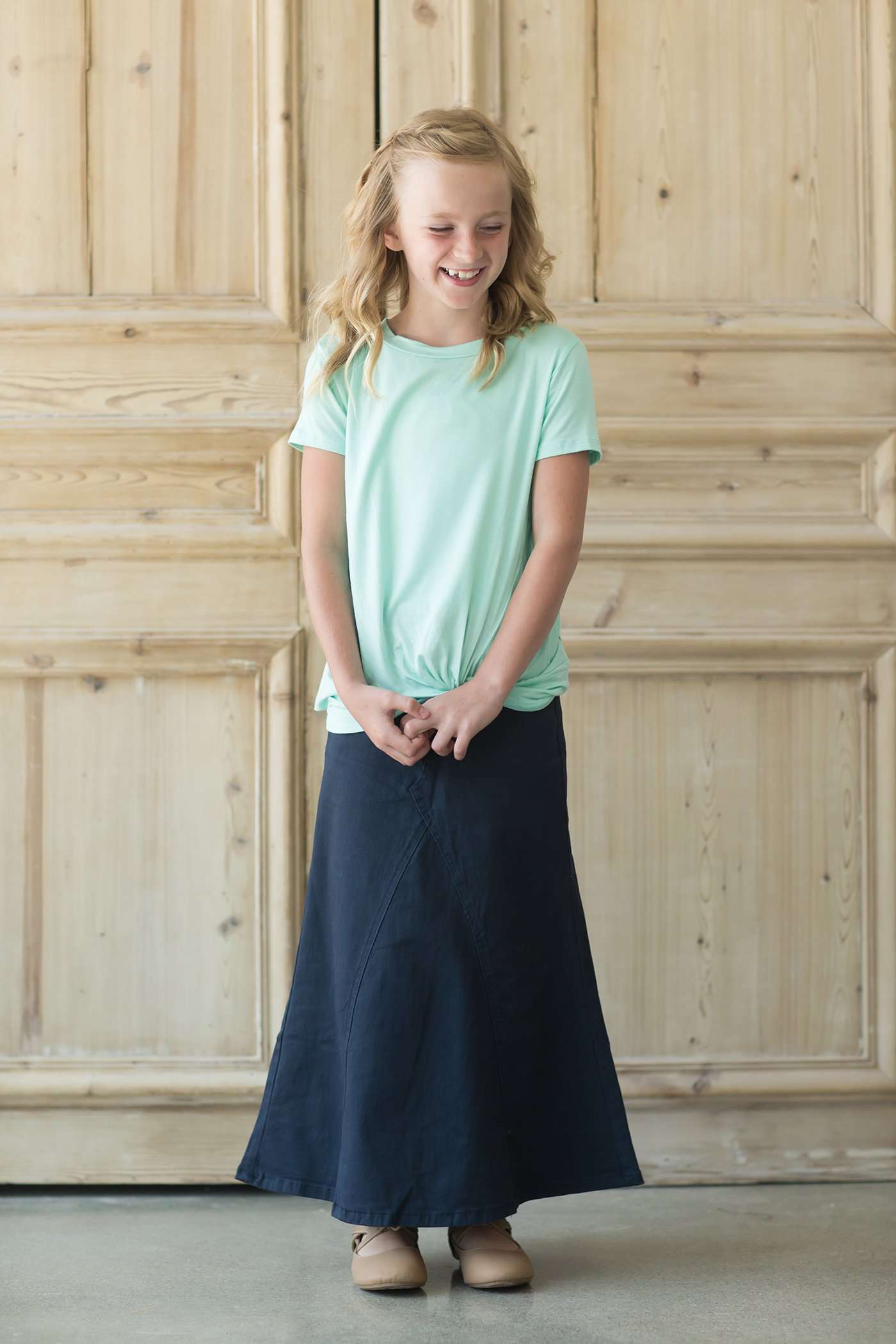 Modest girl's long navy skirt. A-line insert for a flowy, fun look.