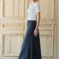 Shop this long, modest navy skirt with a beautiful a-line insert.