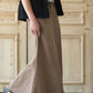 Shop this long, modest khaki twill skirt with a beautiful a-line insert.