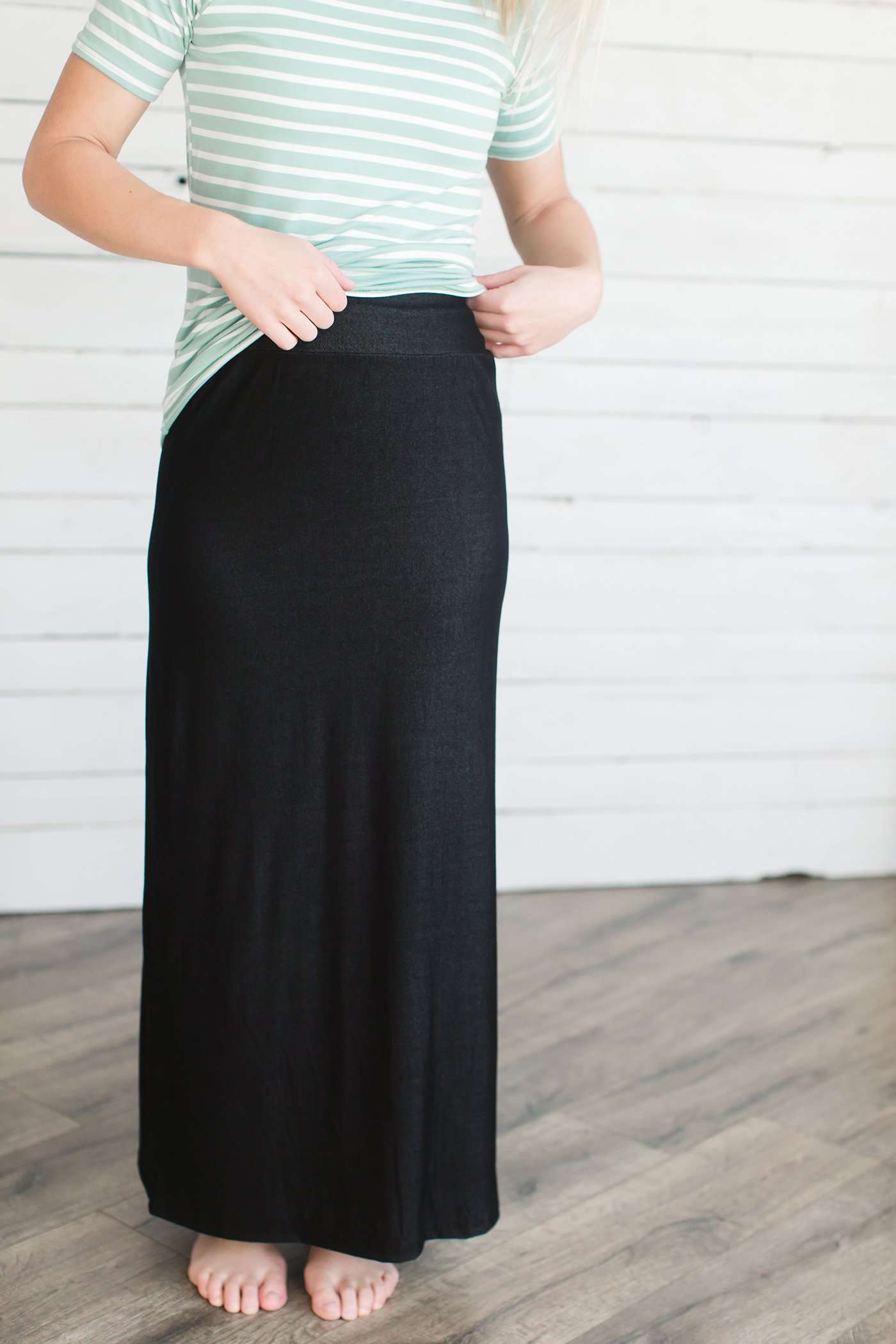 Women's modest denim-like knit skirt in black or navy.