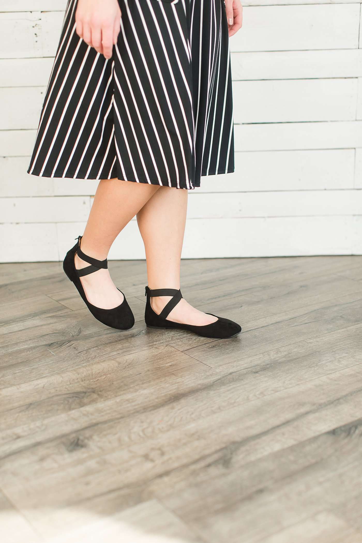 Black or tan ankle wrap faux suede ballet flats.