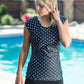 Women's modest cap sleeve swim suit top, black with white polka dots.