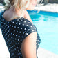 Women's modest cap sleeve swim suit top, black with white polka dots.