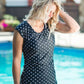Women's modest cap sleeve swim suit top, black with white polka dots.