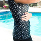 Women's modest cap sleeve swim suit top, black with white polka dots.