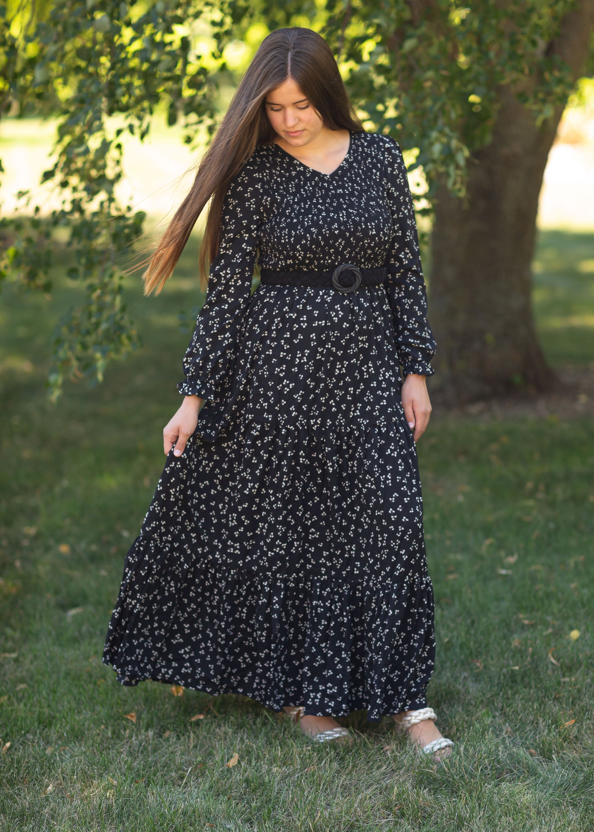 An Inherit Exclusive, the Aurora Floral Long Sleeve Maxi Dress is a fully lined true maxi dress we know you're going to love! This dress comes in either a black or ivory base with an allover floral pattern. The skirt has subtle tiers and the ruffle detail on the sleeves add a touch of flair. The smocked bodice in very comfortable and the modest v-neck adds a feminine touch!