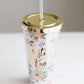 Be still and know double wall tumbler. This tumbler has flowers adorning it and accented with a gold cap and gold writing.