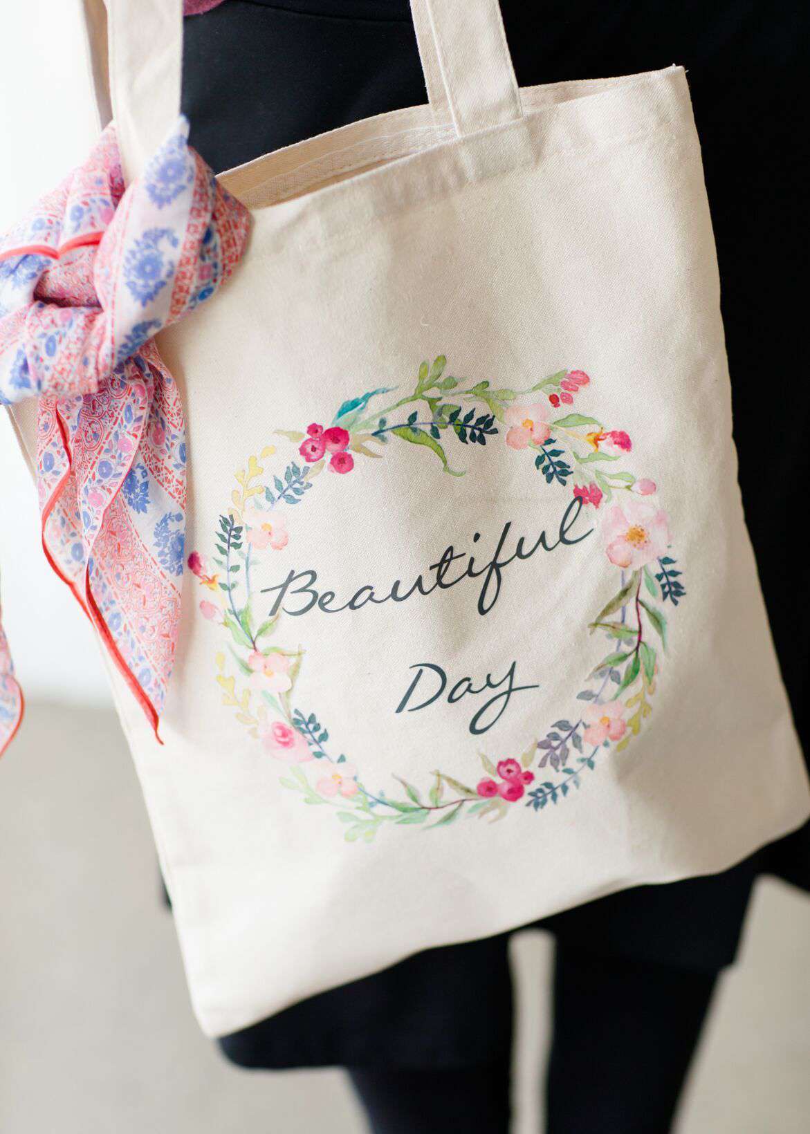 beautiful day floral graphic on a canvas tote