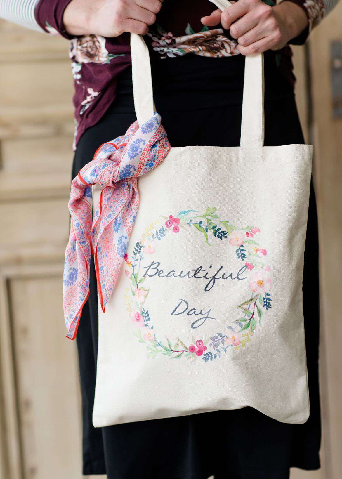 beautiful day floral graphic on a canvas tote