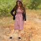 This is a Cinch Waist Athletic midi dress in a purpley taupe color that has a mesh detail and large side pockets. 