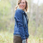 Denim front-zip jacket with removable gray front liner and hood.