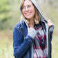 Denim front-zip jacket with removable gray front liner and hood.