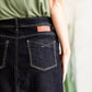 The Beth Dark Wash Long Denim Skirt is an Inherit Design made with you in mind! The dark wash is easy to dress up and details make this a stand out skirt! There is a triple stitch detail on the bottom hem and an Inherit logo patch on the back waistband! A straight fit with a slit in the back makes this long denim skirt super easy to move in and to pair with any tops!