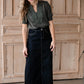 The Beth Dark Wash Long Denim Skirt is an Inherit Design made with you in mind! The dark wash is easy to dress up and details make this a stand out skirt! There is a triple stitch detail on the bottom hem and an Inherit logo patch on the back waistband! A straight fit with a slit in the back makes this long denim skirt super easy to move in and to pair with any tops!