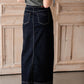 The Beth Dark Wash Long Denim Skirt is an Inherit Design made with you in mind! The dark wash is easy to dress up and details make this a stand out skirt! There is a triple stitch detail on the bottom hem and an Inherit logo patch on the back waistband! A straight fit with a slit in the back makes this long denim skirt super easy to move in and to pair with any tops!