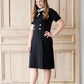 modest black midi dress with gold button accent