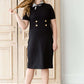 modest black midi dress with gold button accent