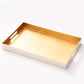Blush organization tray with gold lining.