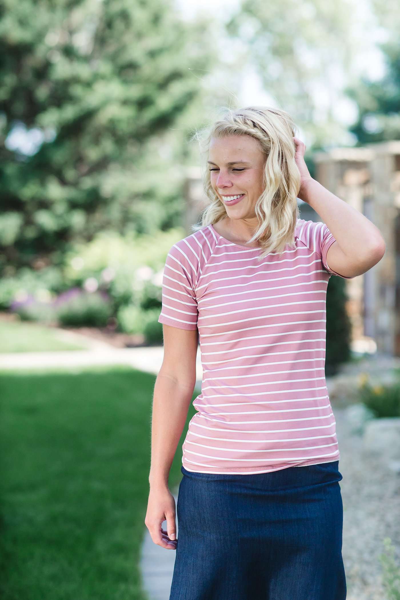 Modest boat-neck and raglan sleeve tee in mauve or teal with white horizontal stripes.