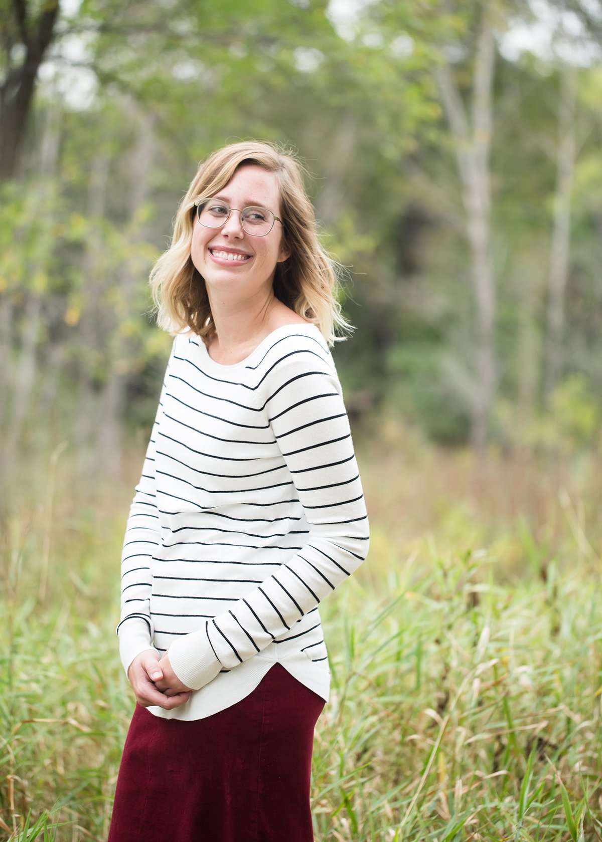Ivory with thin black striped boatneck long-sleeve shirt.