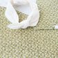 This is a sage colored baby burp cloth, baby bandana and headband gift set.