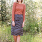 Brick in color, lightweight waffle knit long sleeve top.