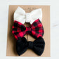 Buffalo check headbands that are white, red and black. Nylon headband or a alligator style clip.