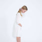 modest girls white peasant dress with pockets and buttons