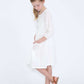 modest girls white peasant dress with pockets and buttons