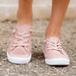 Blush or grey option mesh slip on, laced up shoe. Either color has a white sole.
