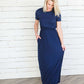Modest women's maxi dress in peach, navy or black. 2 hidden side seam pockets, elastic waist and short sleeves.