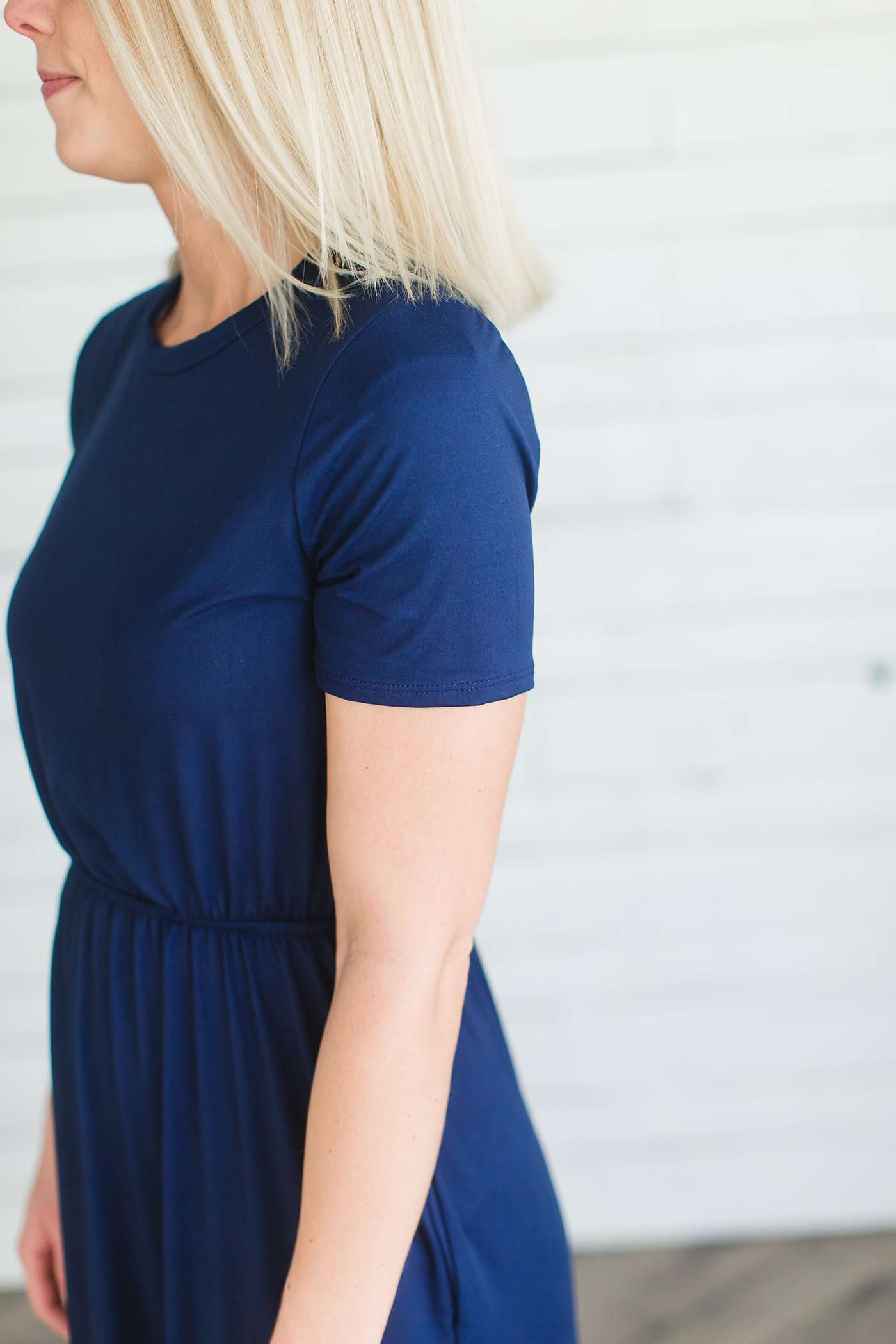 Modest women's maxi dress in peach, navy or black. 2 hidden side seam pockets, elastic waist and short sleeves.