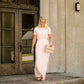 Modest women's maxi dress in peach, navy or black. 2 hidden side seam pockets, elastic waist and short sleeves.