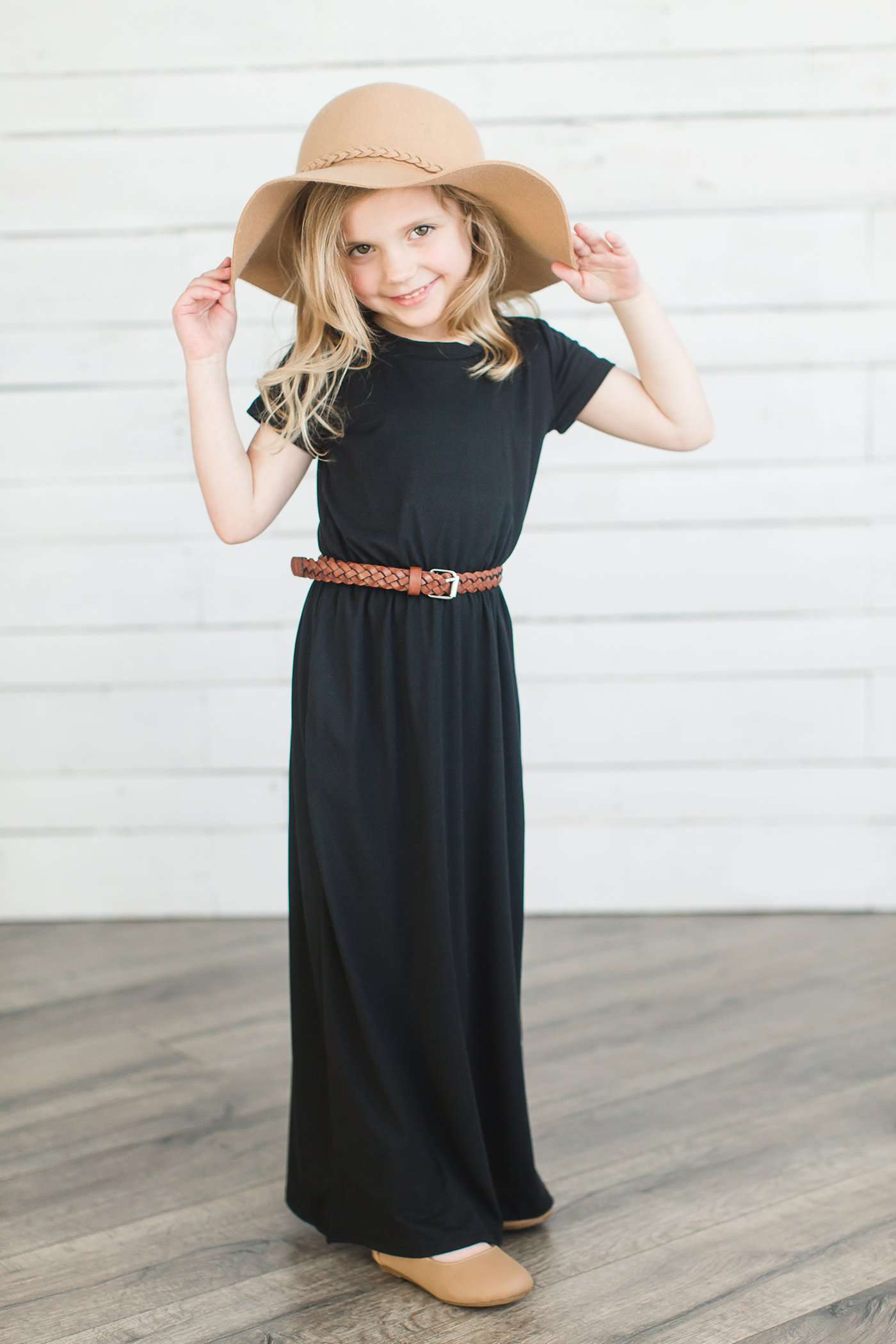 Modest girl's maxi dress in peach, navy or black. 2 hidden side seam pockets, elastic waist and short sleeves.