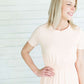 Modest women's maxi dress in peach, navy or black. 2 hidden side seam pockets, elastic waist and short sleeves.