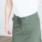 Black, tan or olive option in this long skirt with drawstring waist and side strings to adjust height from midi to maxi