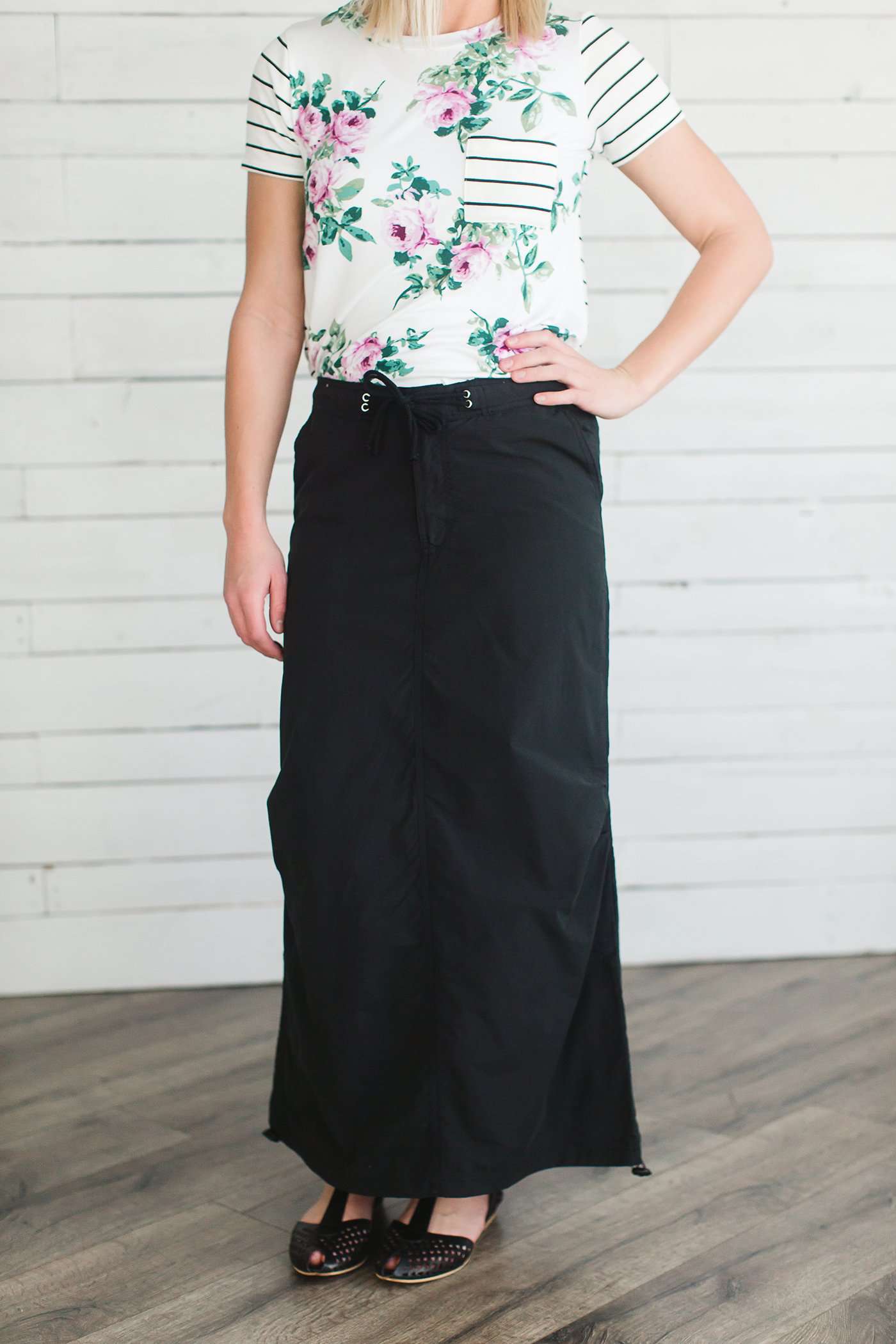 Black, tan or olive option in this long skirt with drawstring waist and side strings to adjust height from midi to maxi