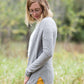 Knit cardigan, in black, heather gray, oatmeal or mauve option. Long sleeves, front pockets and open front.