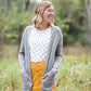 Knit cardigan, in black, heather gray, oatmeal or mauve option. Long sleeves, front pockets and open front.