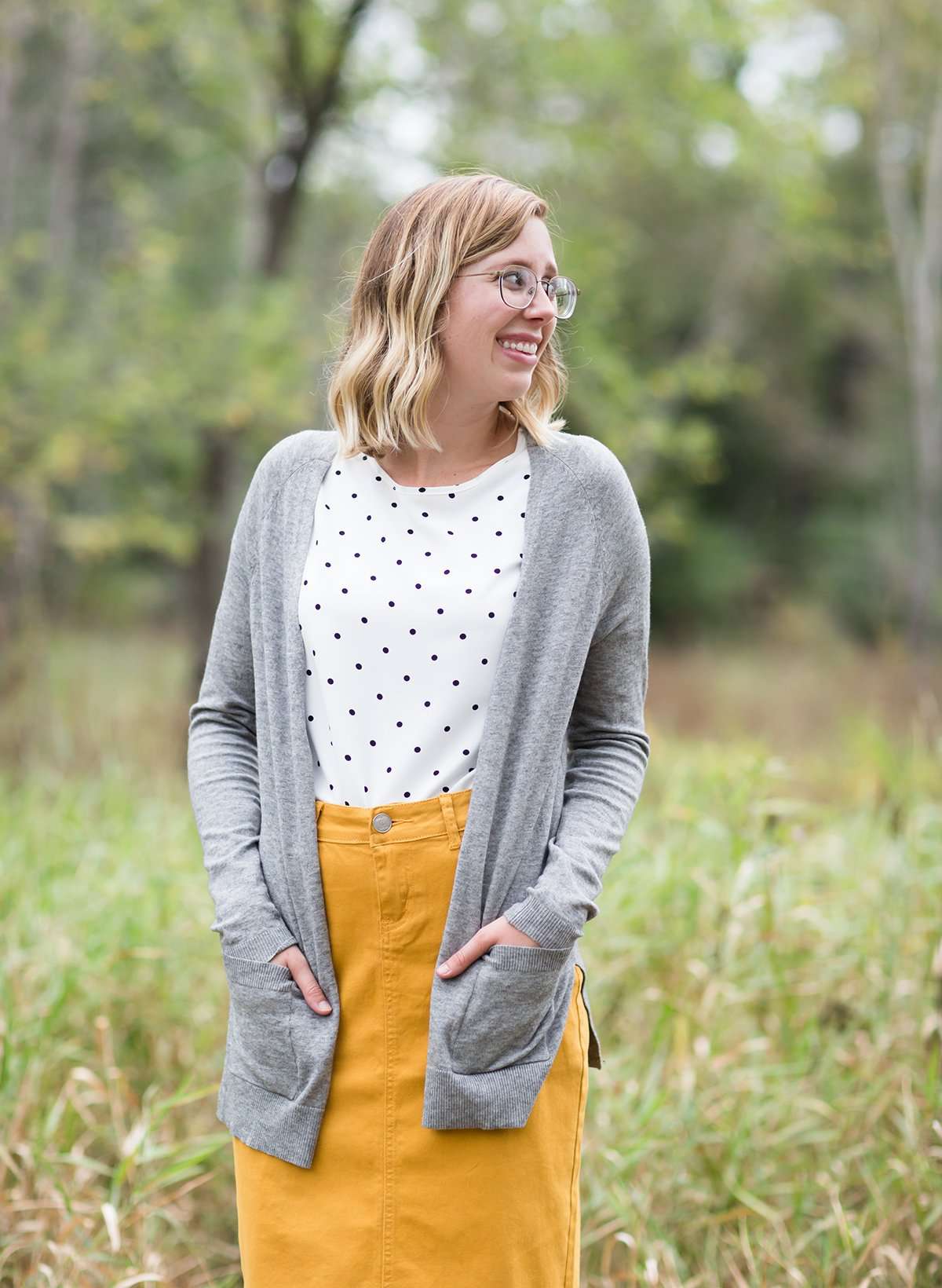 Knit cardigan, in black, heather gray, oatmeal or mauve option. Long sleeves, front pockets and open front.