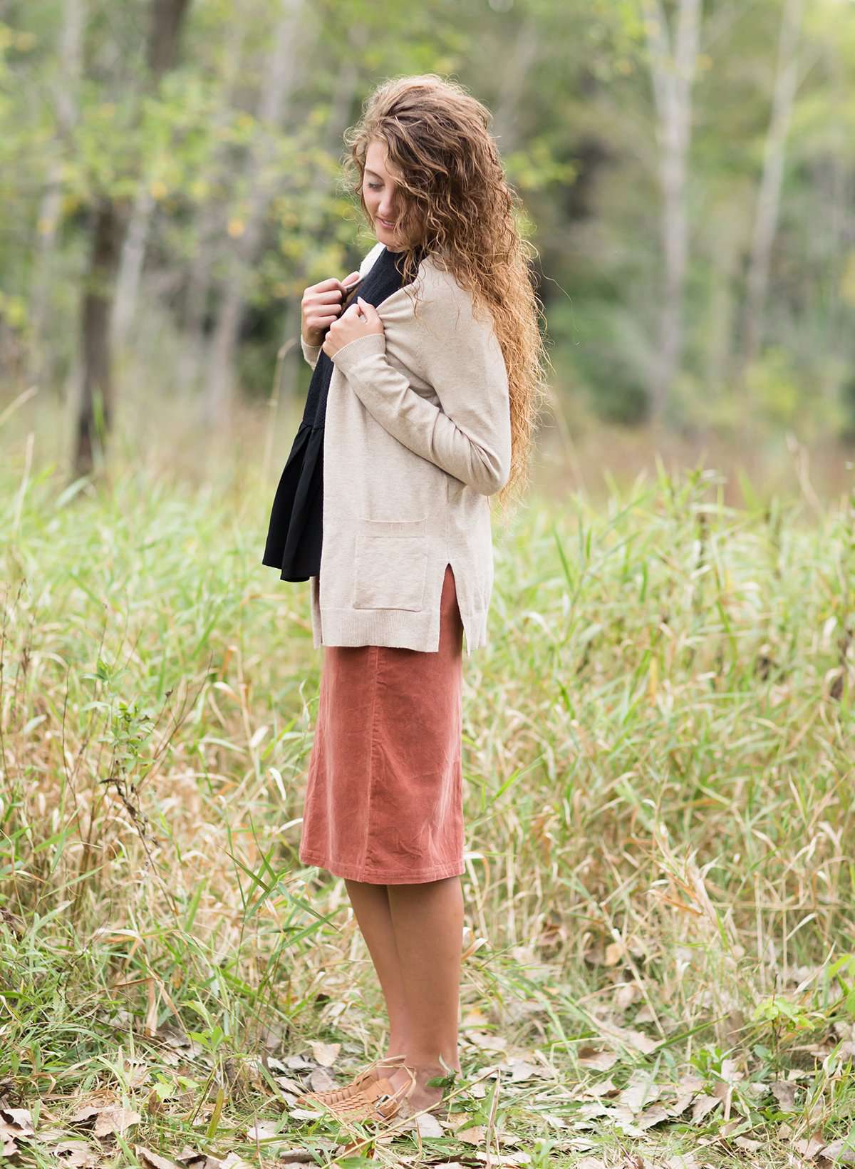 Knit cardigan, in black, heather gray, oatmeal or mauve option. Long sleeves, front pockets and open front.