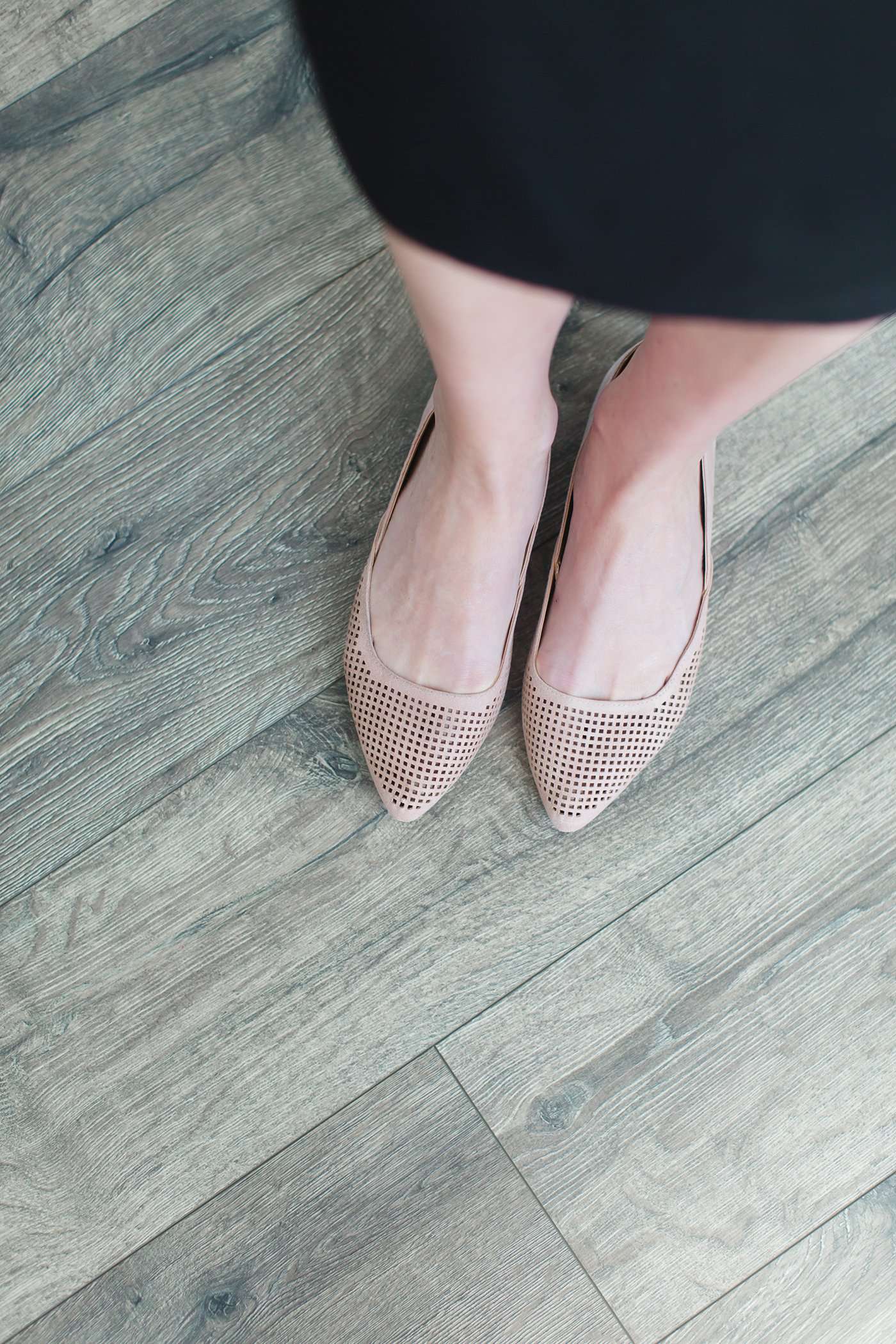 Blush or taupe casually detailed and patterned flat shoe with pointed toe.