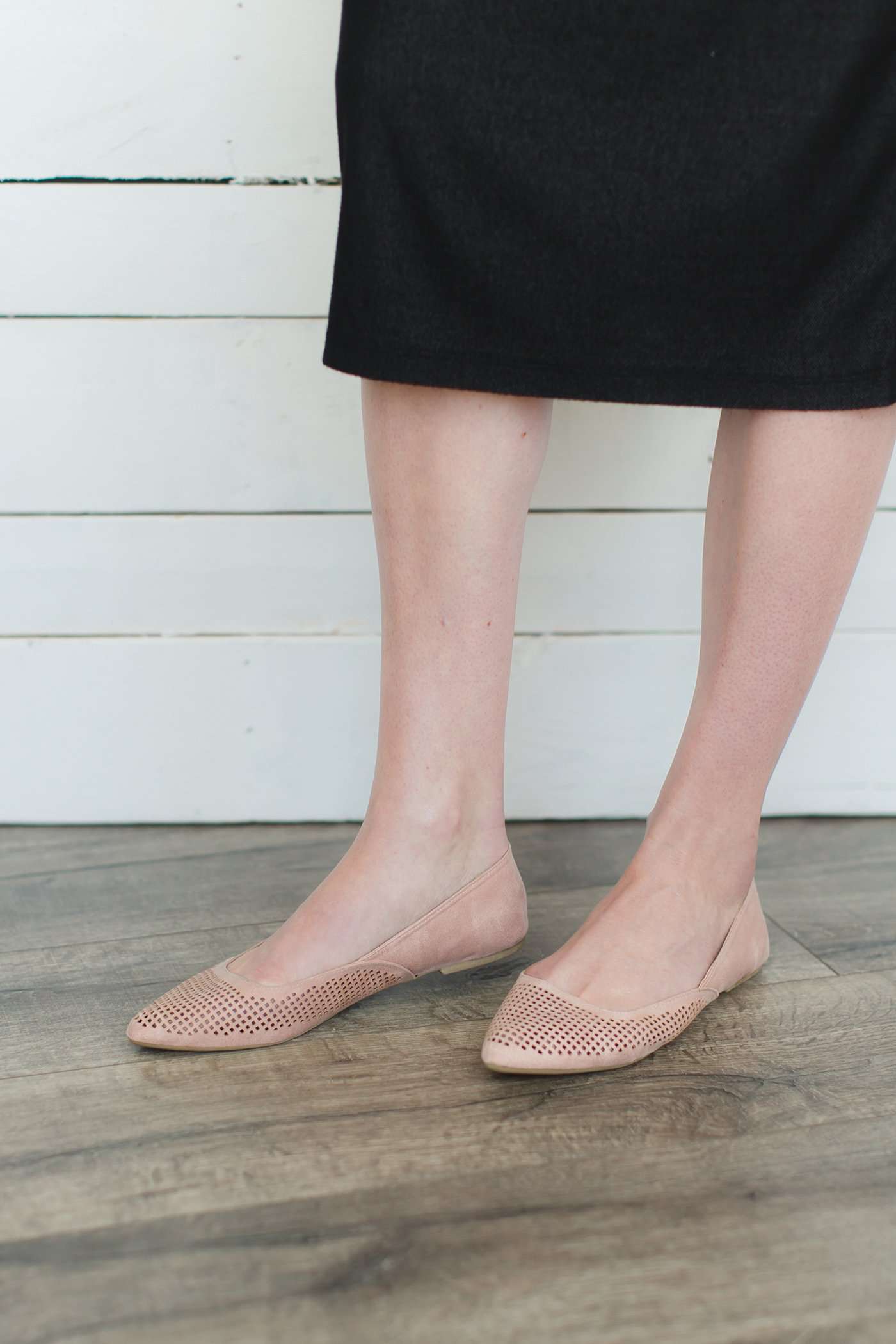 Blush or taupe casually detailed and patterned flat shoe with pointed toe.