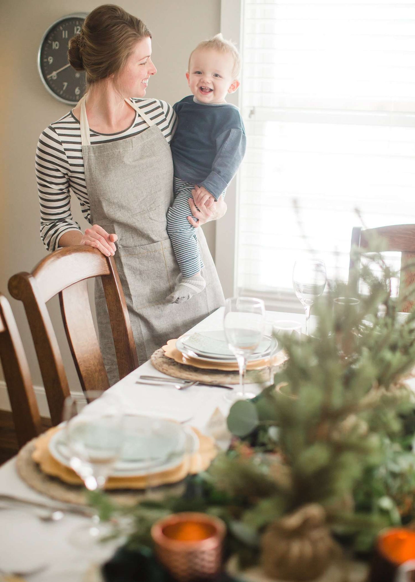 Chambray cooking apron with mustard sticking and cream neck and waist ties