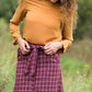 Burgandy with ivory stripe checkers on this below the knee midi skirt and buttons down the front with a back zip, detachable fabric belt and 2 front pockets.